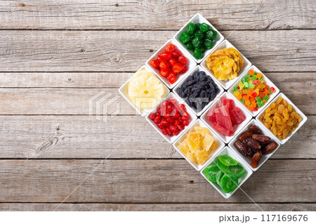 Group of dried and candied fruit in bowl Group of dried and candied fruit in bowl 117169676