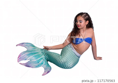 A beautiful girl in a mermaid costume isolated on white background A beautiful girl in a mermaid costume isolated on white background 117170563