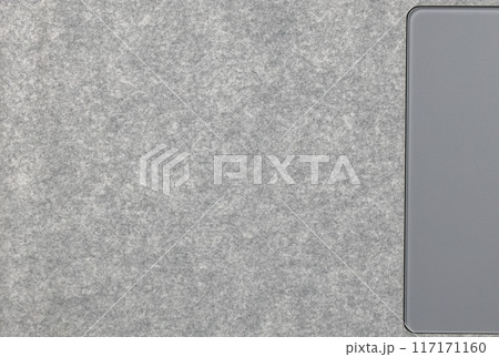 Close up Grey synthetic textile, Alcantara texture use on premium computer notebook. Surface of leatherette for textured background. Close up Grey synthetic textile, Alcantara texture use on premium computer notebook. Surface of leatherette for textured background. 117171160