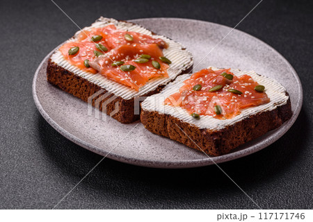 Sandwich or bruschetta with toast, salmon, cream cheese Sandwich or bruschetta with toast, salmon, cream cheese 117171746