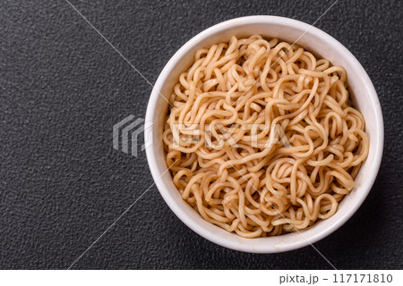 Asian dish rice noodles with salt and spices 117171810