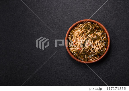 Asian dish rice noodles with salt and spices 117171836