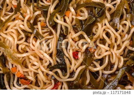 Asian dish rice noodles with salt and spices 117171848