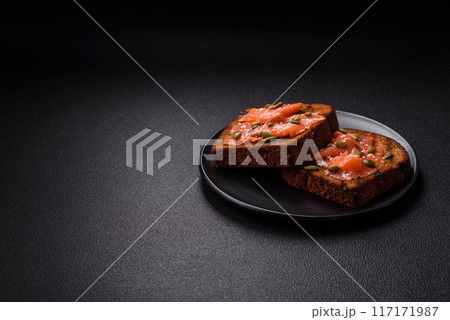 Sandwich or bruschetta with toast, salmon, cream cheese Sandwich or bruschetta with toast, salmon, cream cheese 117171987