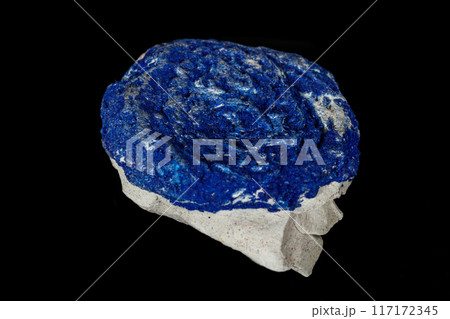 Macro mineral stone Azurite in siltstone against black background 117172345