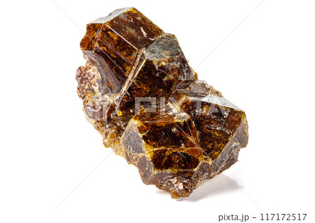 Macro stone Grossular mineral on white background Macro stone Grossular mineral on white background 117172517