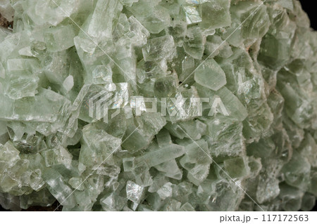 Macro stone Apophyllite mineral on black background 117172563