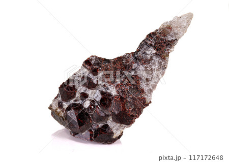 Macro stone garnet mineral on white background Macro stone garnet mineral on white background 117172648
