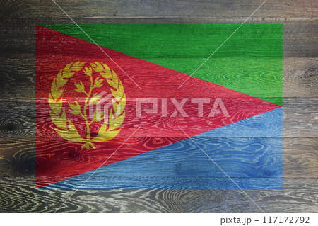Eritrea flag on rustic old wood surface background Eritrea flag on rustic old wood surface background 117172792
