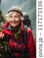 Elderly Woman Enjoying a Mountain Hike 117173336
