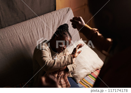 Young helpless woman with newborn baby 117174178