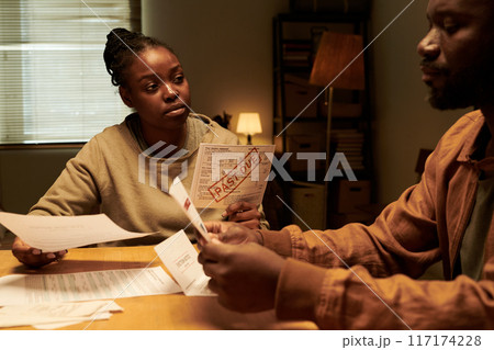 Looking through unpaid financial bills 117174228