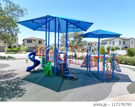 Colorful children playground activities in community public park  117176793