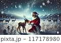 雪の中、トナカイを撫でるサンタクロース 117178980