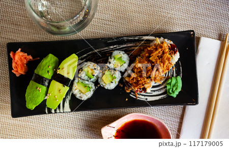 Combined sushi - maki, california, nigiri closeup. Japanese cuisine 117179005