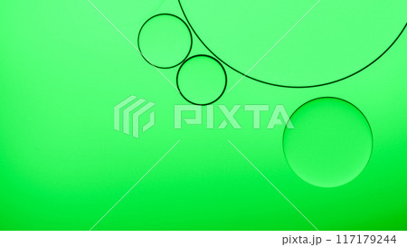 macro abstract photography of oil droplet on green gradient background macro abstract photography of oil droplet on green gradient background 117179244