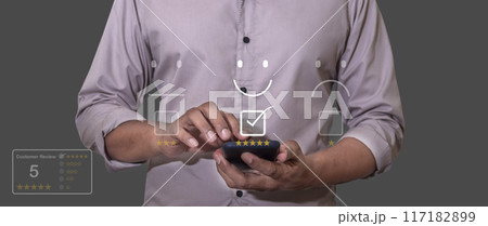 Costomer Review, Hand man Uses, Holding, smartphone mobile with star to review 117182899