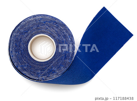 Kinesio tape close-up on a white. Top view therapeutic tape Kinesio tape close-up on a white. Top view therapeutic tape 117188438