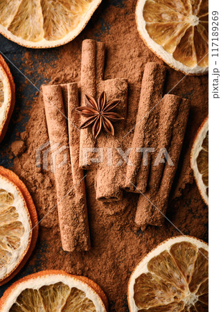 Creative Christmas aromatic concept with cinnamon sticks Creative Christmas aromatic concept with cinnamon sticks 117189269
