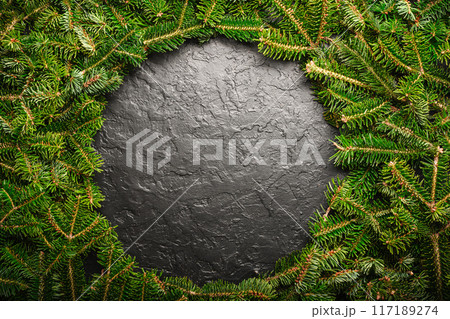 Creative Christmas or New Year background with a round border 117189274