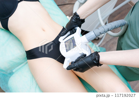 A woman is getting a bikini wax 117192027