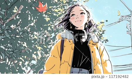 紅葉の秋の公園を歩く若い女性