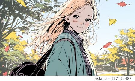 紅葉の秋の公園を歩く若い女性