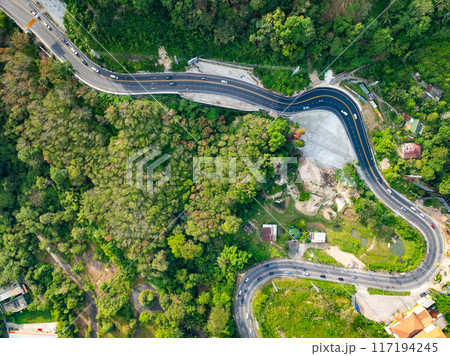 Aerial view of mountain road in forest in summer season, Top view from drone of curve road, Landscape with curved roadway, Beautiful trees Travel asia Phuket Thailand 117194245