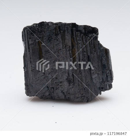 natural black tourmaline scherl on the white background natural black tourmaline scherl on the white background 117196847