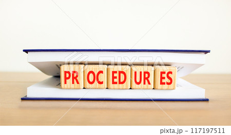 Procedures symbol. Concept word Procedures on beautiful wooden cubes in book. Beautiful wooden table white background. Business procedures concept. Copy space. Procedures symbol. Concept word Procedures on beautiful wooden cubes in book. Beautiful wooden table white background. Business procedures concept. Copy space. 117197511