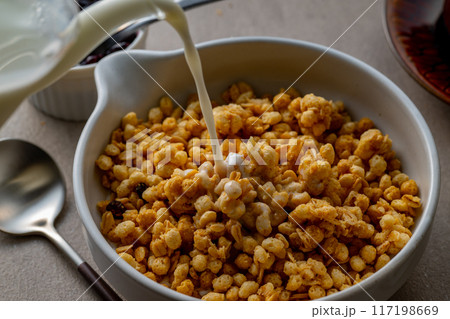 Milk and granola. Breakfast image. Milk and granola. Breakfast image. 117198669