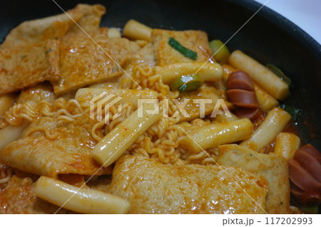 Korean food Tteokbokki, stir-fried rice cakes and fish cakes in a sweet and spicy sauce Korean food Tteokbokki, stir-fried rice cakes and fish cakes in a sweet and spicy sauce 117202993