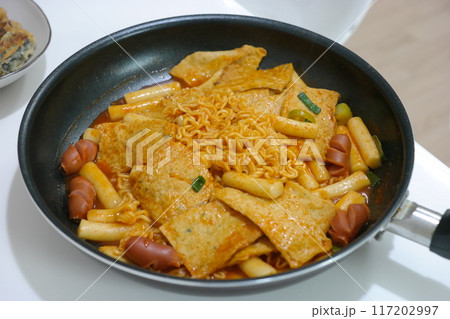 Korean food Tteokbokki, stir-fried rice cakes and fish cakes in a sweet and spicy sauce Korean food Tteokbokki, stir-fried rice cakes and fish cakes in a sweet and spicy sauce 117202997