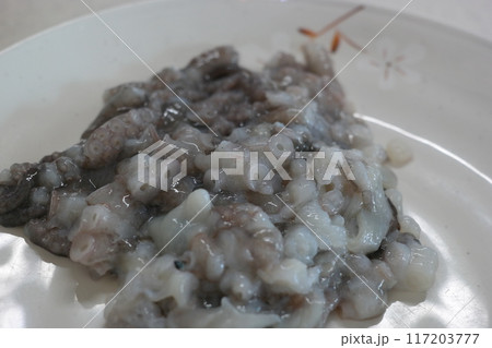 Chopped live octopus 117203777