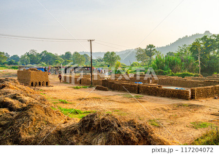 Traditional wood fired brick kiln in a village Traditional wood fired brick kiln in a village 117204072