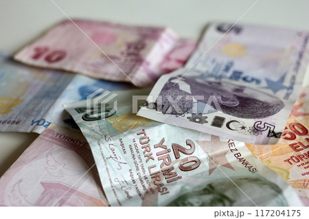 Ankara, Turkey - 04 06 2023: Turkish lira banknotes of different denominations on a white background 117204175