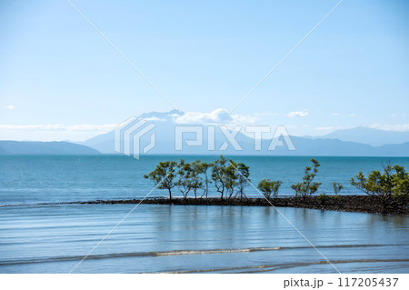 Calm Coastal Landscape with Mountains Calm Coastal Landscape with Mountains 117205437