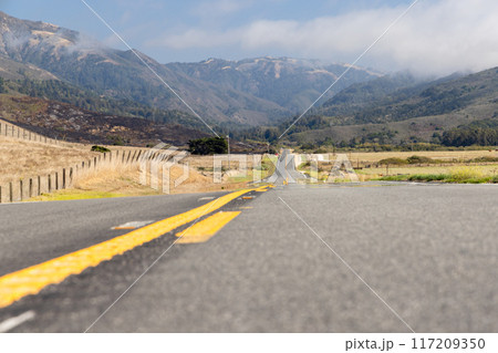 Asphalt road and countryside landscape 117209350