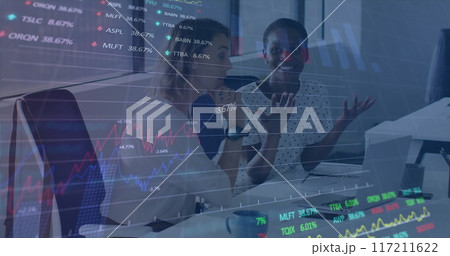 Image of financial data processing over diverse colleagues discussing work in office Image of financial data processing over diverse colleagues discussing work in office 117211622