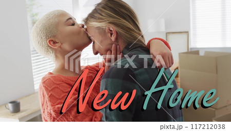 Image of new home text over gay lesbian couple kissing at home 117212038