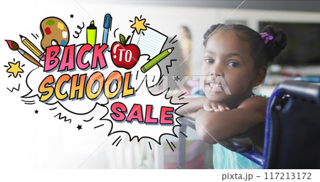 Image of back to school text over happy african american schoolgirl at school Image of back to school text over happy african american schoolgirl at school 117213172