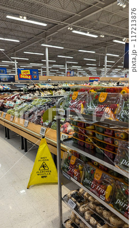 Fresh vegetables and fruits on the counter in a superstore. Fresh vegetables and fruits on the counter in a superstore. 117213876