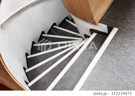 Spiral staircase goes down, abstract architecture photo 117214475