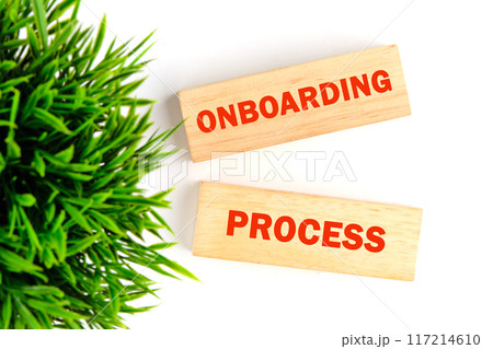 Onboarding Business Process New Employee Welcome Concept. Onboarding worker management. ONBOARDING PROCESS a phrase made of wooden blocks on a white background, top view Onboarding Business Process New Employee Welcome Concept. Onboarding worker management. ONBOARDING PROCESS a phrase made of wooden blocks on a white background, top view 117214610
