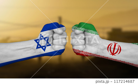 Israel against Iran, two hands punch each other against a blurred landscape background, fists painted with the national flags 117214687