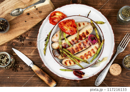 German grilled barbecue sausages. 117216133