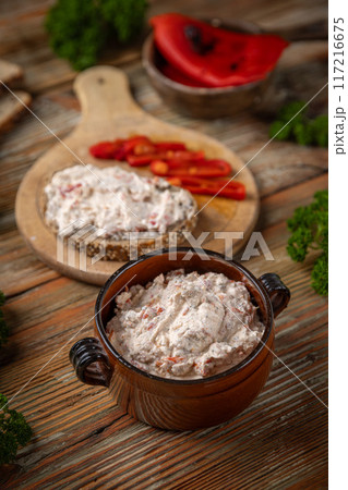 Rustic bowl filled with a cream cheese Rustic bowl filled with a cream cheese 117216675