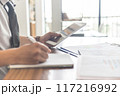 Side view of freelancer work from home 117216992