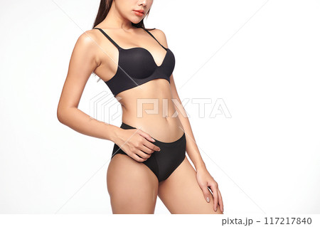 Confident beautiful young asian woman posing in black lingerie on white background, Perfect body, Confident beautiful young asian woman posing in black lingerie on white background, Perfect body, 117217840