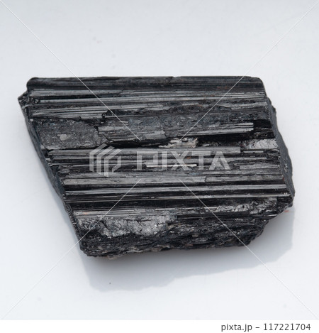 natural black tourmaline scherl on the white background 117221704